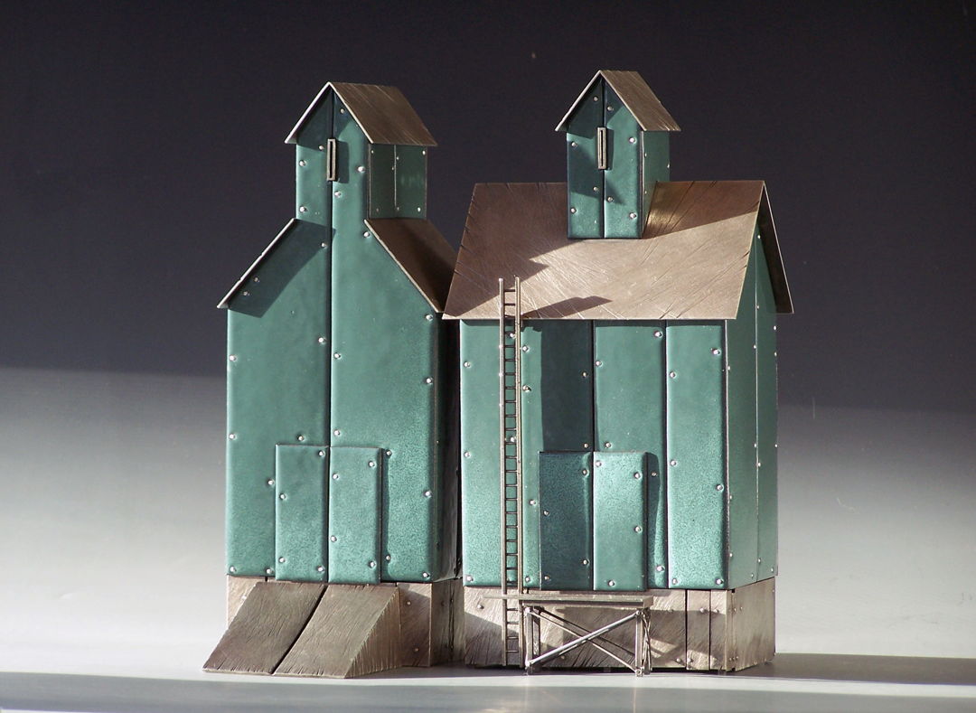 Sterling silver and traditional kiln-fired glass enamel on copper.