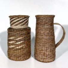 Locally gathered Akebia vines. The browns are all natural colors  the off white is the same material but the bark has been stripped off.