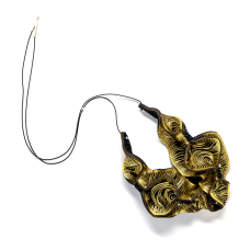 Oryx were introduced into New Mexico's White Sands Missile Range (Trinity site) in 1969 as exotic big game where they have thrived. The image of spiraled black horns against white gypsum sands alongside folk Mexican flower carvings inspired this pattern.