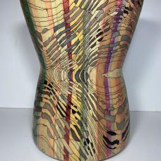 This hourglass form  made from maple  had such powerful grain lines that I had to make this central to my design. Hidden beneath the grain lines emerged numerous egg forms that remain discreetly embedded throughout the form