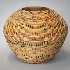 A wood treasurer basket turned on a wood lathe. Embellished with India Ink and a burning pen. Original Native American baskets used fiber that was dark brown to black and a red fiber they harvested in nature. My colors are to resemble the colors they used.