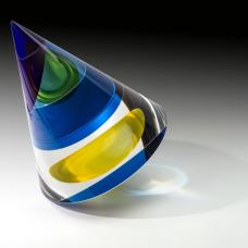 Optical glass that has been cold-worked: a centuries old Bohemian technique using no heat  but rather room temperature glass is shaped using water and abrasives in conjunction with lapidary tools. The techniques involved are cutting  grinding  polishing  laminating and coloring.