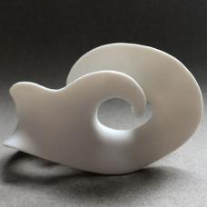 This high fired porcelain piece was created by pinching  cutting  twisting  and handbuilding. It has an unglazed surface.