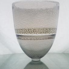 Using a combination of technique and optics  this series emphasizes linear distortion and severance. The patterning creates two versions of the ‘moire’ effect  a visual perception that occurs when viewing a set of lines over top of another. The visual distinction creates a simple  yet complex relationship between the levels of each work.