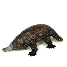 Platypus-inspired leather sculpture with stone &amp;quot;bill&amp;quot;  wire armature  apoxy sculpt/wire webbed feet  glass eyes  painted &amp;quot;fur&amp;quot;