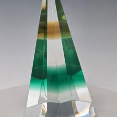 Cold-worked kinetic glass  wobbles around on pencil point base.