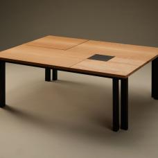 Golden rectangles and squares of quartersawn and bookmatched American sycamore surround a black square in a one-of-a-kind coffee table. The pieces are separated by 1/8 inch and float on a nearly invisible frame. Eight ebonized beech legs are proportioned by the golden ratio.