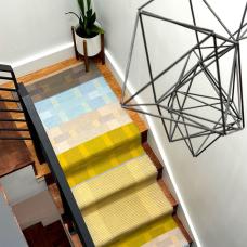 Contemporary rag rug handwoven in 100% cotton yarn and fabric strips using the traditional Log Cabin Weave technique