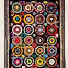 rectangular tapestry with colorful concentric circles