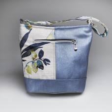 blue and white purse with branch pattern
