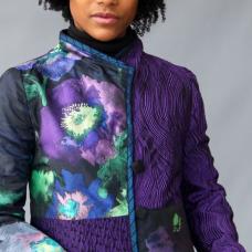 Pieced and pleated silk jacket with handmade buttons and trim.