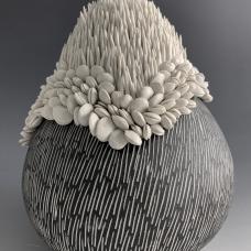 Made from porcelain on the wheel  motifs are handmade  underglazed  hand carved  fired to high/medium fire.