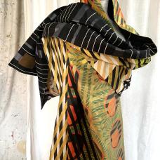 Every inch of fabric is hand painted with graphics done with a 3/8&amp;quot; brush. The result is mesmerizing on both solid and woven patterned fabric. This piece is all cotton  and is washable.