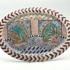 A handbuilt platter  depicting various tile patterns  inspired by the Al-Hambra Palace  Spain.