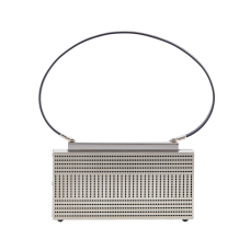 La linea bag is hand fabricated in etched stainless steel with a detachable leather strap  internal leather gussets and a magnetic closure.