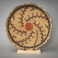 Chumash winnowing tray. Maple wood turned on a Robust American Beauty lathe  burning pen  India Ink.