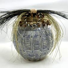 Wheel thrown ceramic vessel intricately carved  South Carolina Coastal sweetgrass attached  also wooden beads help align the combination of both art forms.
