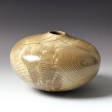 Elm wood hollow form made from a crotch section of the tree.