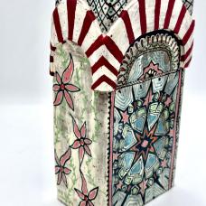 Hand built vase  depicting a 3-D archway which is inspired by the Grand Mezquita Cordoba.