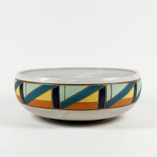 This geometric serving bowl has been carefully designed  underglazed and carved. Fully functional wheel-thrown stoneware.