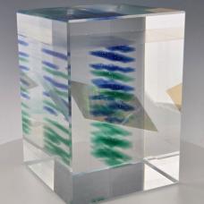 Cast and cold-worked glass  includes dichroic slice.