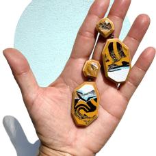 handcut upcycled skateboards with hand fabricated sterling silver findings