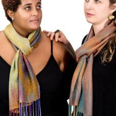 Handwoven scarves  hand painted warp and hand dyed tencel a sustainable yarn from Eucalyptus trees. Woven in original pattern on a floor loom. Colors and pattern pay homage to the Lilac breasted roller(L) and Sacred Kingfisher(R)emphasizing iridescence of yarn and patterns to mimic feathers.