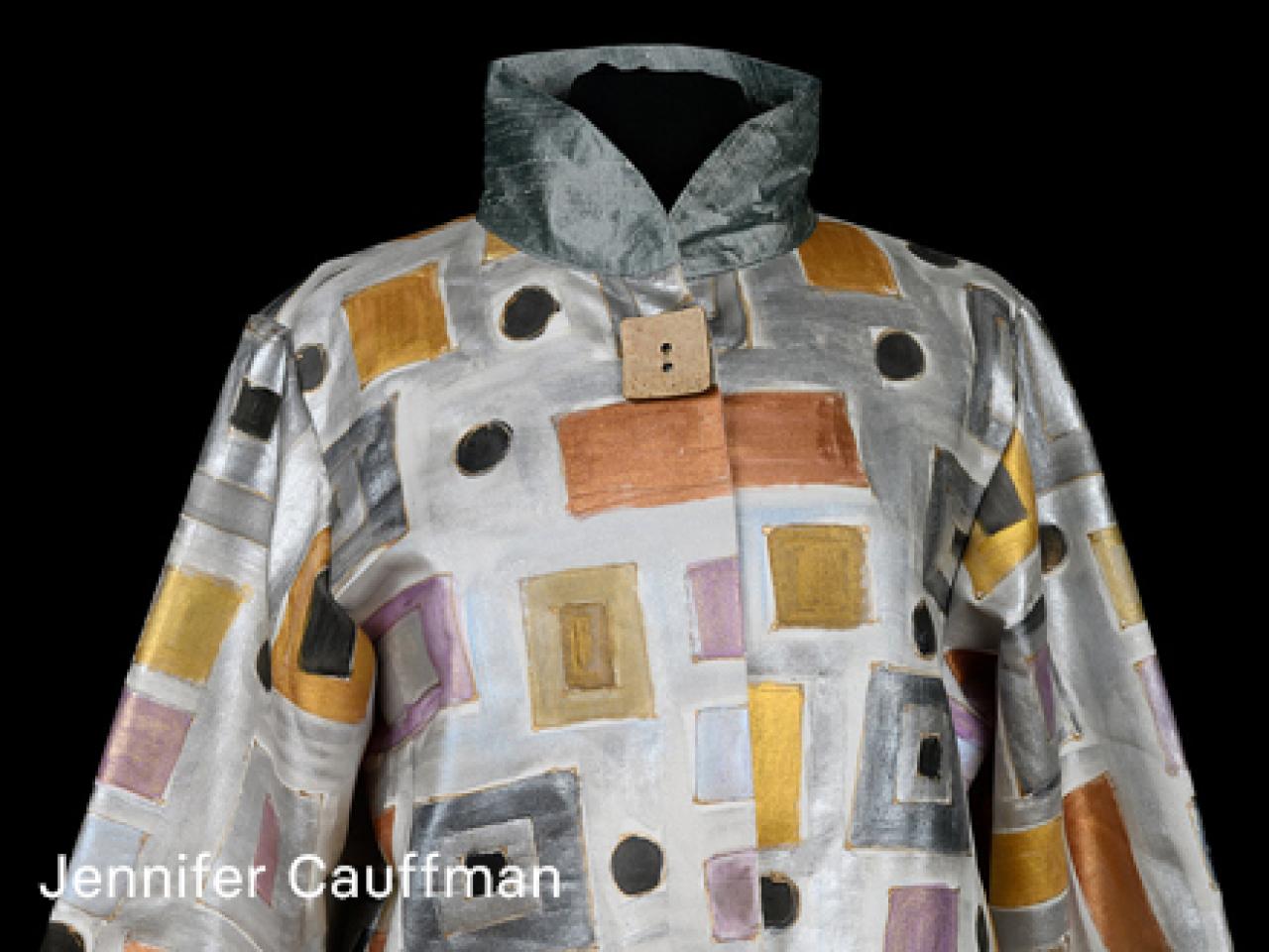 geometric patterned coat with square button